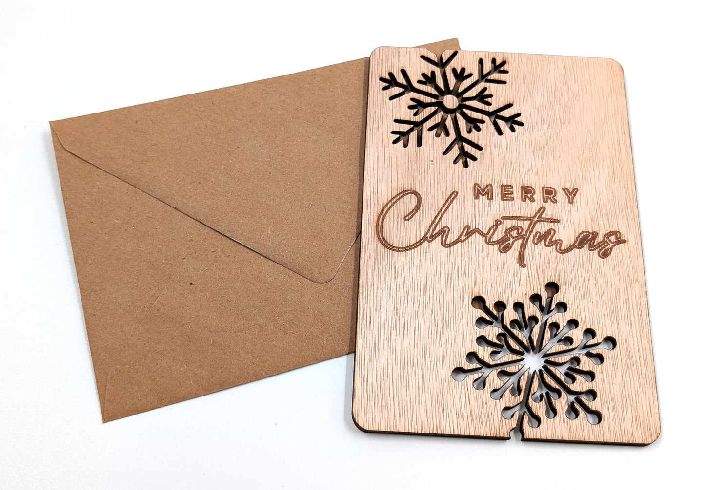 Houten kerstkaart – Merry Christmas sneeuwvlokken – sneeuwvlok uitsnede – kerstkaart met envelop – luxe kerstkaarten